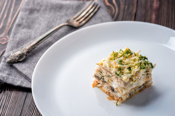 Fish pie with a dough, egg and fresh herbs