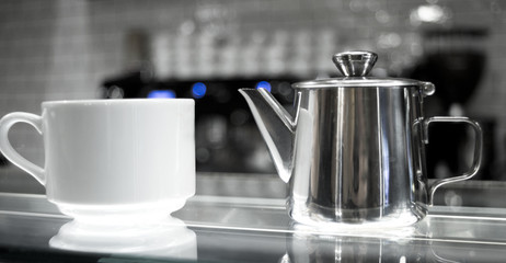 Coffee cups on glass counter