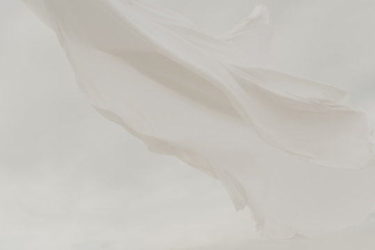 White fabric blowing in the wind