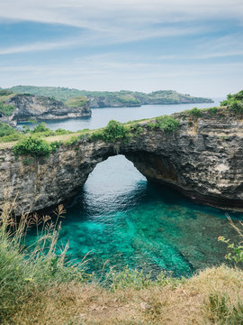 Stone arch over ocean