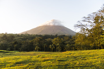 Fototapeta premium View of the Arenal volcano in Costa Rica at sunrise