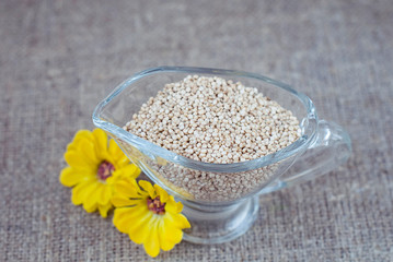 Krupa kinoa in glassware on a linen tablecloth