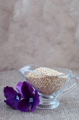 Krupa kinoa in glassware on a linen tablecloth