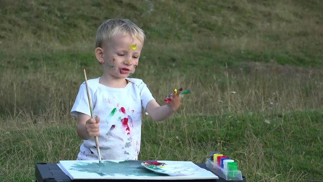 Creative child painting in nature, Colorful life 4k