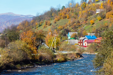 Fototapeta na wymiar Autumn Carpathian mountain river (Ukraine).