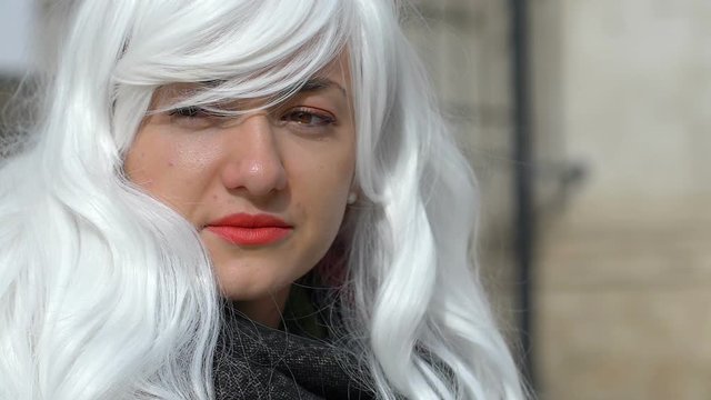 funny woman with silver wig. Close up