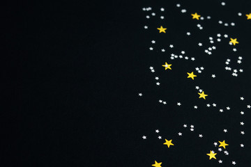 stars on a black paper background