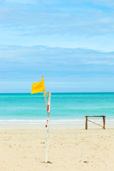 Yellow flag on the beach of Varadero, Cuba.