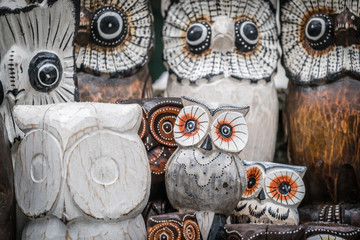 Fototapeta premium Wooden owls for sale