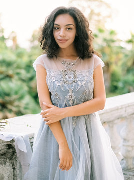 Young sensual woman in wonderful dress
