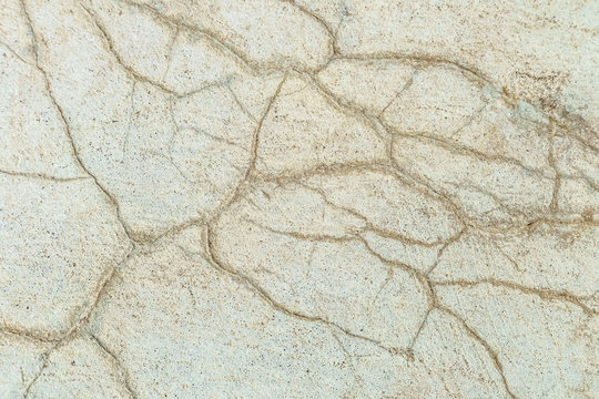 Surface cracked cement concrete. Textural background.