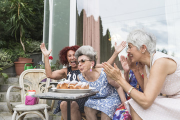 Senior woman at birthday party