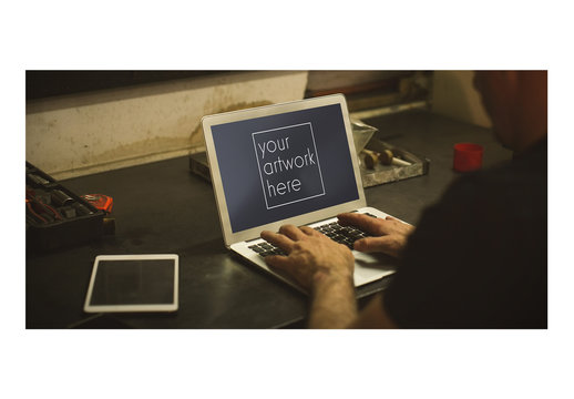 Mechanic Using Laptop Mockup 2