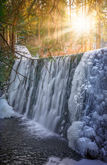 Obraz premium Sunshine over Wild waterfall in Karpacz