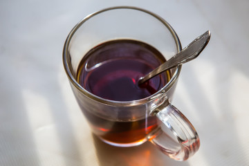 mug of tea on the windowsill in the morning