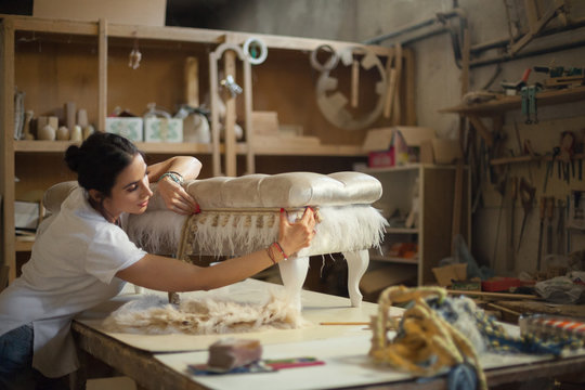 Furniture designer at her workshop