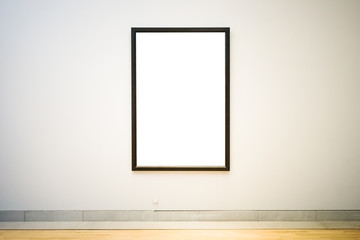 White clipped painting with wooden dark frame hung on a white wall.