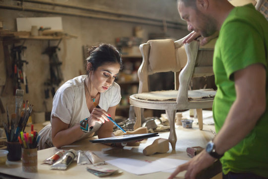Furniture designer at her workshop