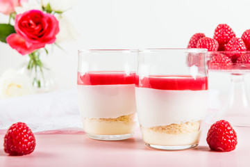 Raspberry dessert from whipped white chocolate mousse and raspbe