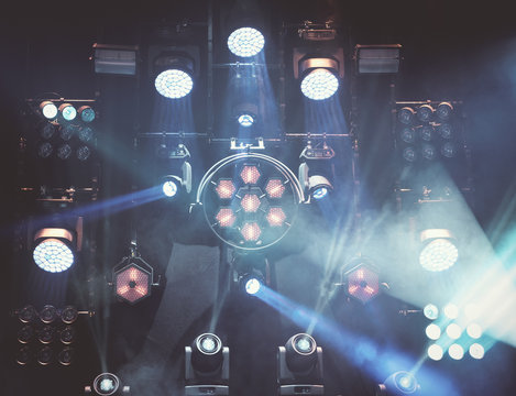 stage lights during a music concer or festival with smoke