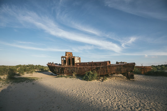 abandoned rusting trawler stranded in former aral sea