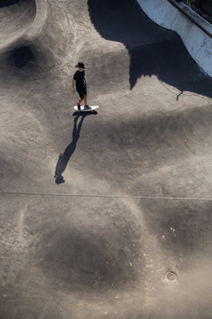 Young skater in a skate park