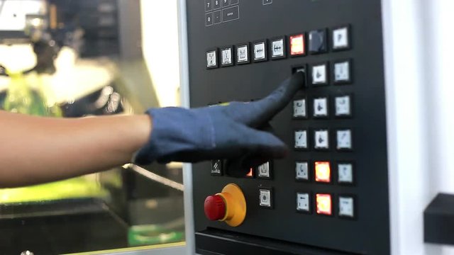 programming a cnc machine in engineering workshop