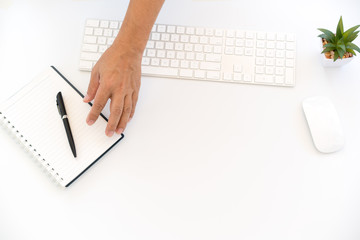 White Workspace with keyboard And notebook