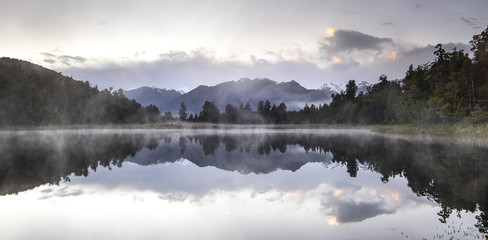 New Zealand lake view refection with morning sunrise sky 