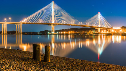 Port Mann Bridge, long exposure in a bright night. Vancouver, British Columbia, Canada.