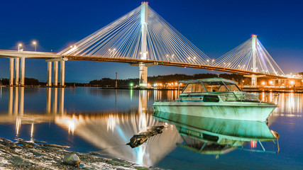 Fototapeta na wymiar Port Mann Bridge, long exposure in a bright night. Vancouver, British Columbia, Canada.