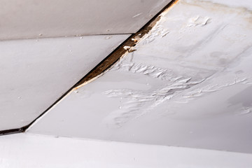 Damaged ceiling from water leak in rainy season