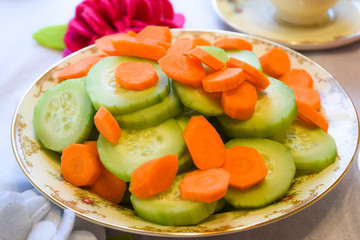 Sliced cucumbers and carrots