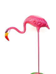 pink ceramic flamingo figures with white background