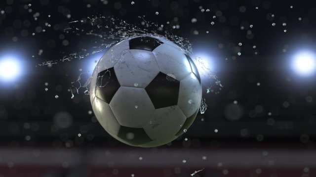 Soccer ball flying through water drops slow motion 4k