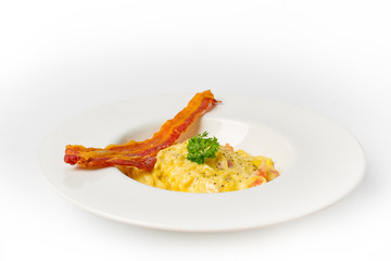 spaghetti carbonara white cream sauce with crispy bacon on white background