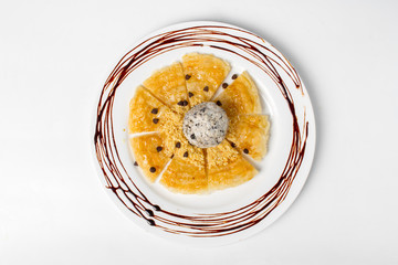 Desserts, Roti fried top ped with scoop choccolate chips ice cream on white background