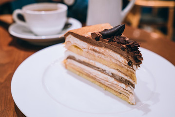 multilayer cake and coffee