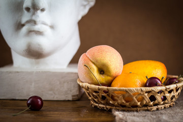 The fruit in the basket.  Still life of fruit.