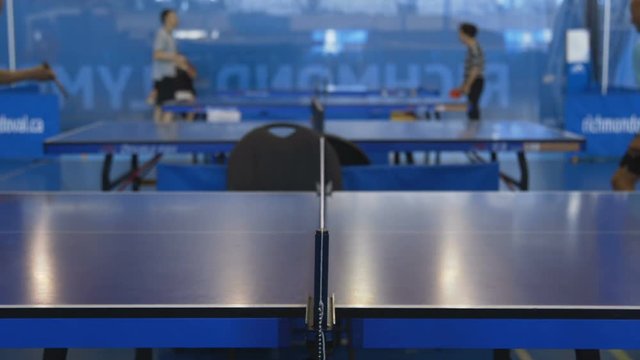 Ping pong game over a ping pong table