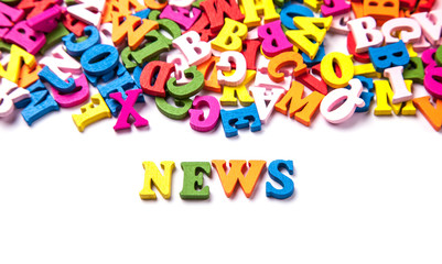 Word NEWS from color letters of the English alphabet