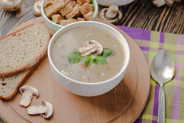 mushroom soup in a wooden background