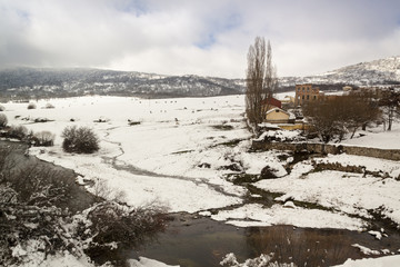 Snowy landscape in Guadarrama National Park, Segovia River. Castilla y Leon, Spain - obrazy, fototapety, plakaty