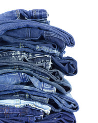 jeans stacked on white background blank for design and text input.