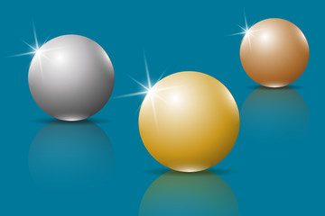 Golden, silver and bronze 3D spheres. Three glossy spheres with reflection in a glass surface.