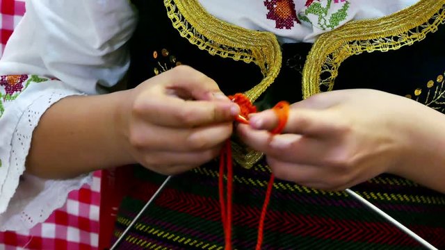 Woman is knitting winter clothes in close up, 4k Video Clip