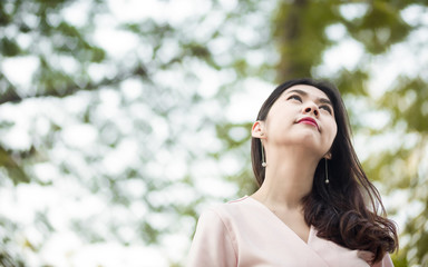 Fototapeta premium Beautiful woman in the park.