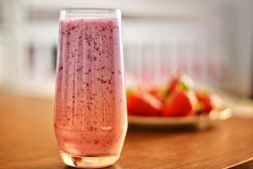 fresh strawberry cocktail on a table in a plate