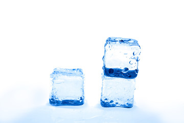 Blue ice cubes on white background.