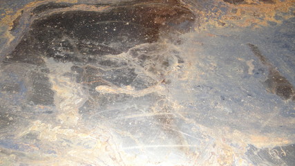 The texture of the metal and rust.